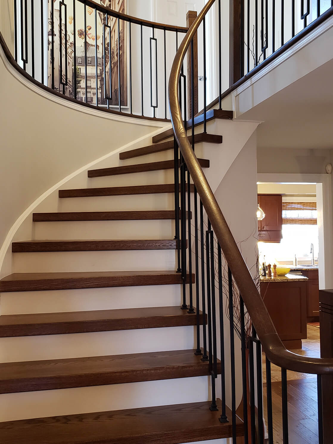 curved staircase renovation in burlington