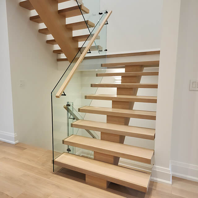 open riser stairs with glass railings